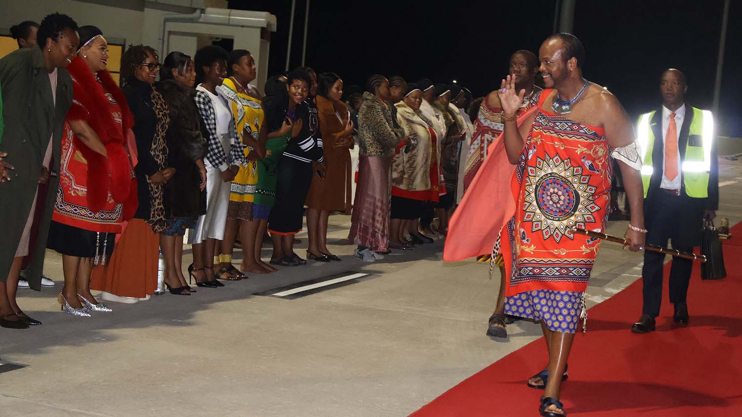 His Majesty King Mswati III greets members of the public who had turned out at King Mswati III International Airport to warmly welcome him back home